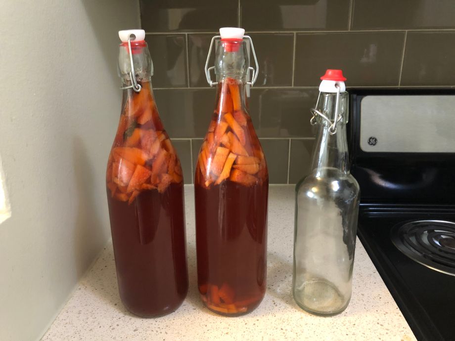 Strawberry+anise and a strawberry+ginger with an empty bottle for scale.
